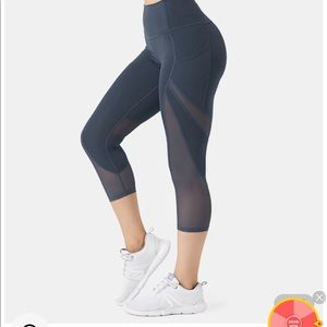 Halara High Waisted Contrast Mesh Side Pocket Plain Capri Legging